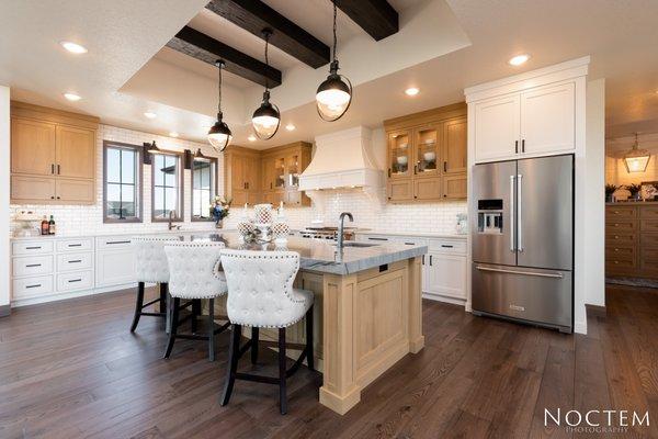 Gourmet Kitchen with gas stove, custom painted cabinets, granite countertops, engineered wood flooring