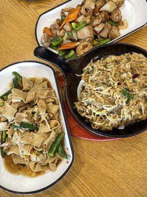 Tofu skin and pepperd (left), thinly sliced pork and picked vegetables over vermicelli (right), sauteed intestines with vegetables (top)