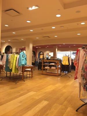 Nice bright store with clean lines and nice clothes.