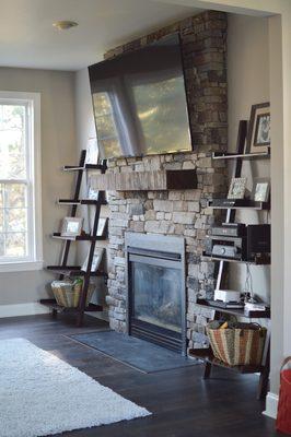 Custom stone fireplace with hand-made mantel