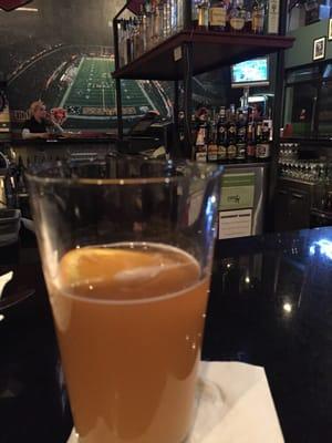 Sitting bar side enjoying a Blue Moon draft