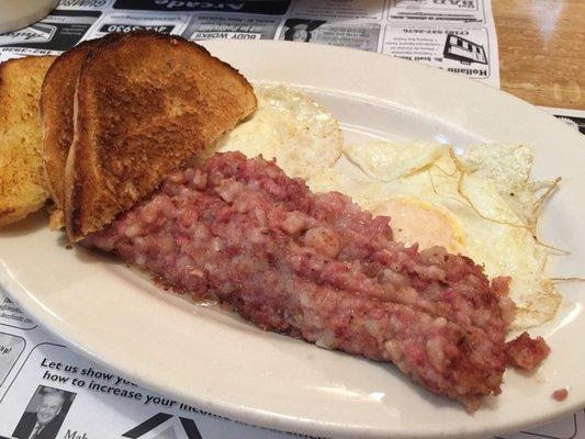 2 Eggs over medium, hash, and salt rising toast. Worth it.