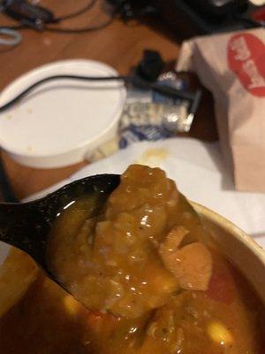 Some kind of brown clumpy substance in chicken tortilla soup.... NO CHICKEN AND IT IS AS BAD AS IT LOOKS !!!