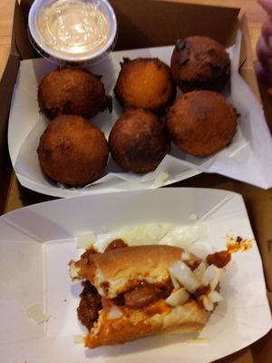 No clam fritters today. But yes on hush puppies with spicy mayo and a loaded chili cheese dog with onions.