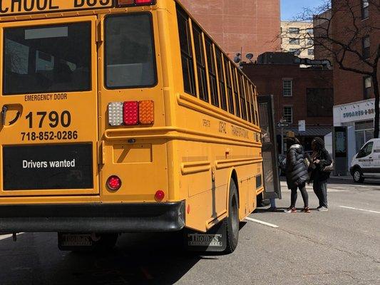 Stopped DIAGONALLY on a 5 lane stretch of 3rd Avenue (between 26th & 27th St) in Manhattan and had kids board the bus!!!