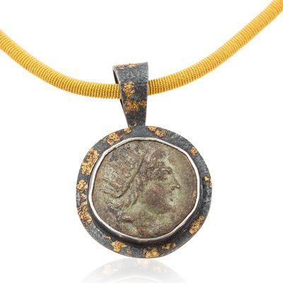 Genuine ancient coin in custom sterling silver and 24kt bezel by Fairchild and Company.