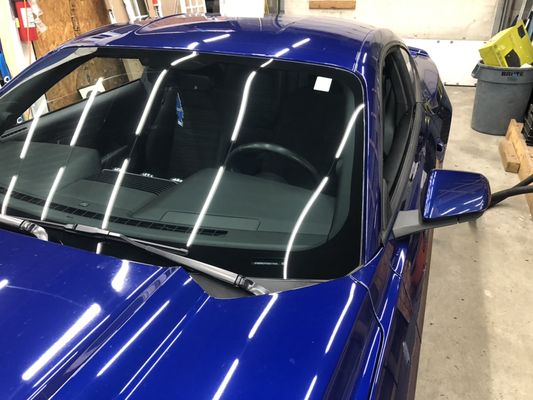 New windshield replacement complete on Ford Mustang.