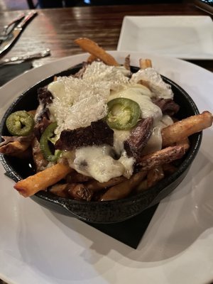 Short rib poutine with pickled jalapeños