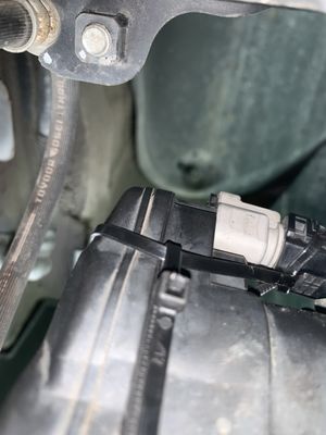 Zip tie pulling connector onto housing