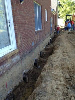 INSTALLATION OF PIERS FOR MINE SUBSIDENCE DAMAGE.