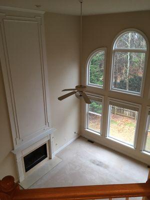 Upstairs view of living room cleaning