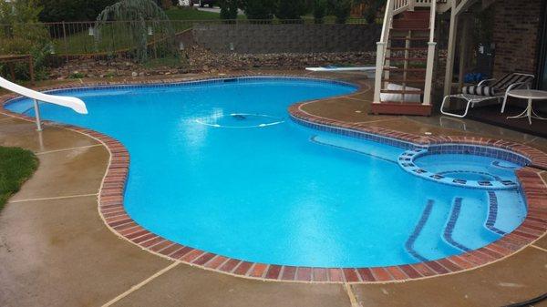 A pool we designed a custom safety cover for.