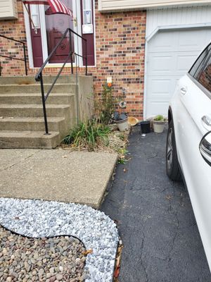 Another view of the mess left at our front steps and the small bed that was not touched at all