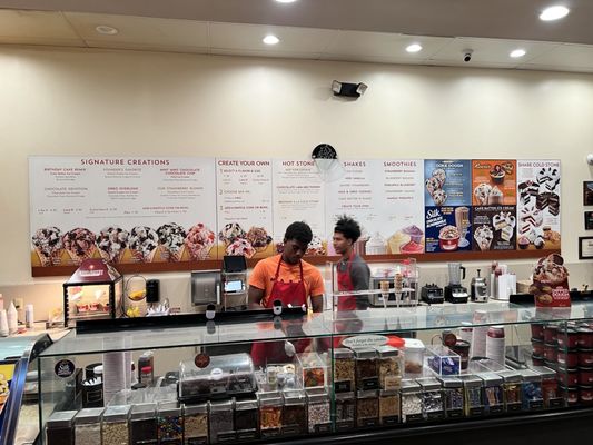 Team working behind the counter.