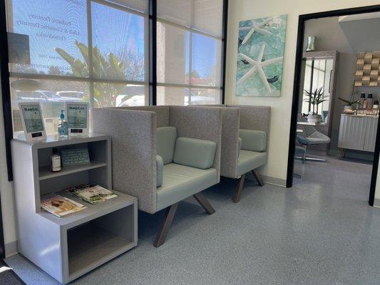 Additional seating in the waiting room tailored for privacy.