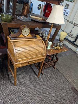 Antique children's roll top desk, antique mantel clock, antique table and lamp