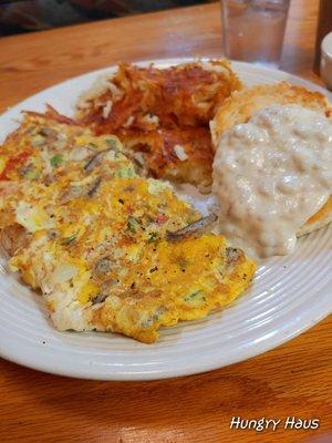 Veggie Omelette with hashbrowns well-done. Up charge for a biscuit and a cup of gravy is only $1.29.