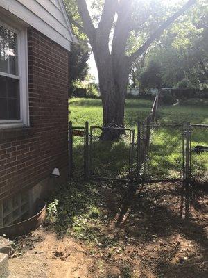 Repaired fence they did with their sign