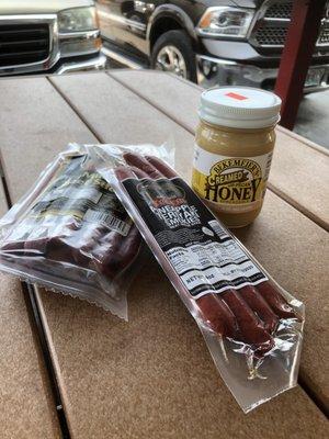 Buy local meats, spices, bread, and preserves. All kinds of yummy things to taste and try. And yes that is my brown truck!