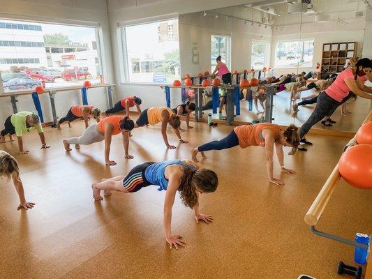 Planks look differently for everyone - some at the barre, some on the floor, some with their knees down. You do you!