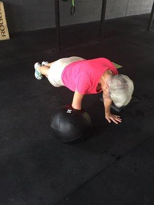 Karen doing an awesome job holding a plank position. No excuses! No limits!