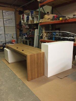 Reception desk in final stages of production.