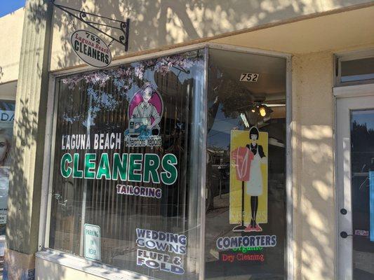 A store window front with the business name.