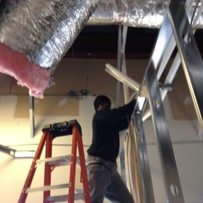 Jeril running some insulation at A new hair salon in Cobb County