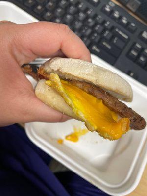 English muffin breakfast sandwich with sausage patty