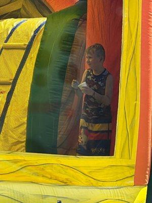 Breylen enjoying bounce house