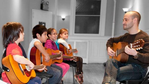 Group guitar classes are one of many classes offered at BSM.