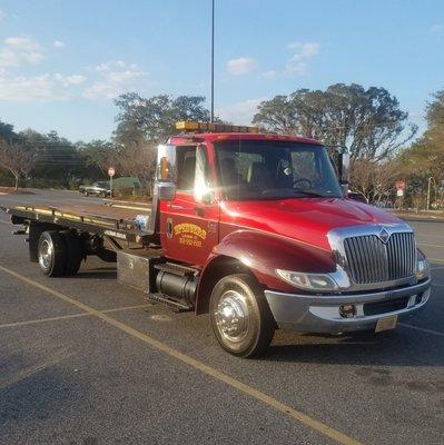 We offer flatbed towing service