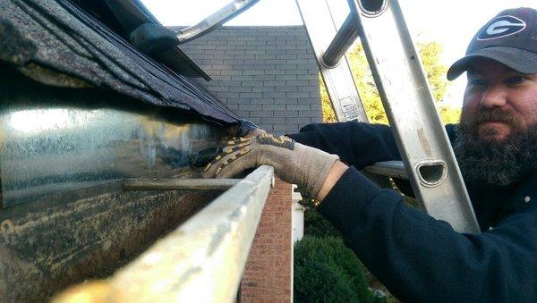 Galvanized metal blocking off squirrel entry.