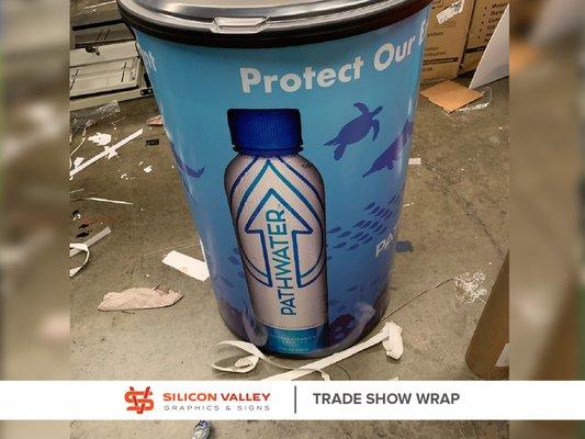 The trade show podium wrap with premium custom printed graphics is ideal for trade exhibitions, presentations, or display