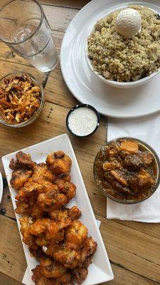 Buffalo cauliflower wings, coleslaw, yams, and cornbread, collard greens and mac & cheese combo.