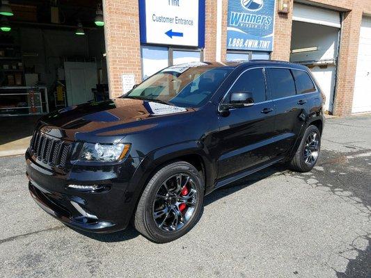 Jeep Grand Cherokee tinted with solar Gard Galaxie 20% with a lifetime warranty and solar guard clear bra Pro on fenders hood and bumper