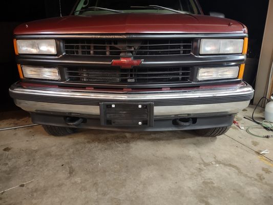 1998 Chevy k 1500 with severely flaking front grill. Repaired for $150. Bow tie refurbish was included.