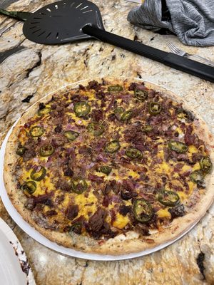 Brisket and jalapeño bbq pizza. Pre-made by Fresh. Crust could be better but brisket was clutch