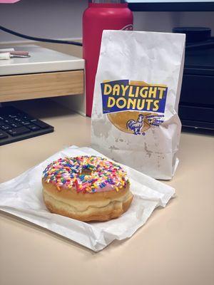 My glazed donuts and my free pink sprinkles donut!