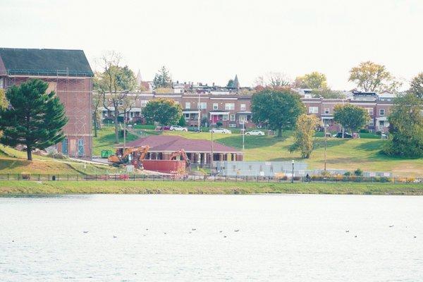 Lake and view with Adjacent Homes & School during construction.