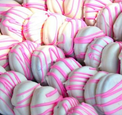 Easter Oreos. White chocolate drizzled with a pastel Easter colors, shown here in pink. $4 dozen