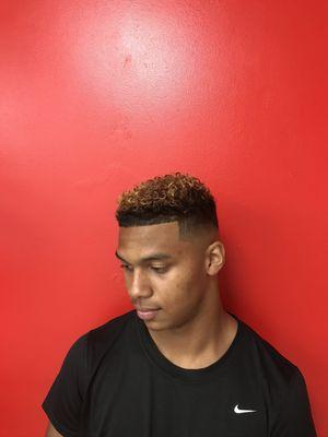 Mid fade with curly top and highlights!