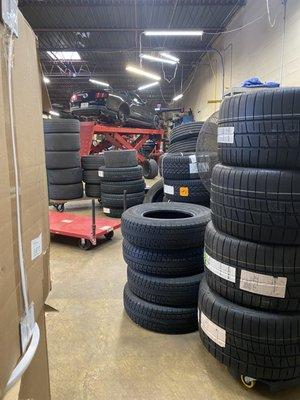 Stack of tires waiting for installation.