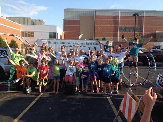 Walk, roll, or pedal down the local parades with Circus Kazoo.