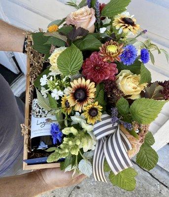 Gorgeous bouquet of fresh, local blooms in a keepsake crate and a bottle of wine from Walla Walla!