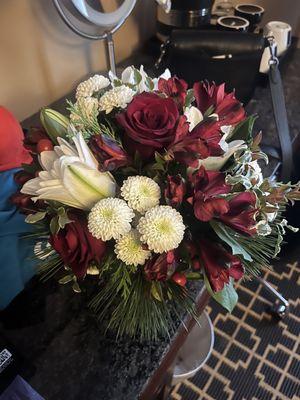 Slightly romantic Christmas themed medium arrangement.