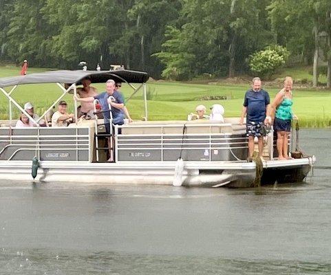 Another pontoon boat pulling up to bathe.