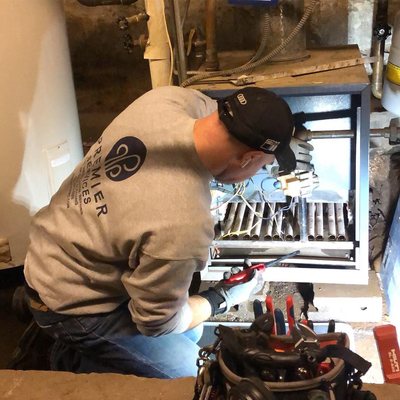 Boiler repair in flooded basement after a rain storm in Manhattan.