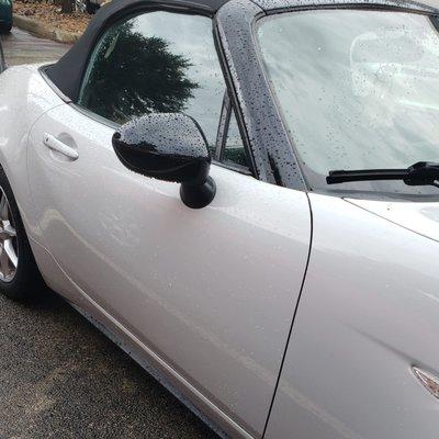 The MX-5 top trim, side mirror and they buffes oit the scratches on the door. Even washed it before the rain started