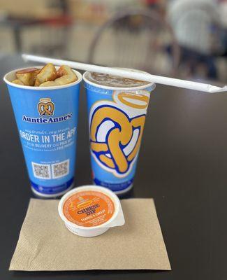 Pretzel sticks, Coke, and cheese dip - MEAL